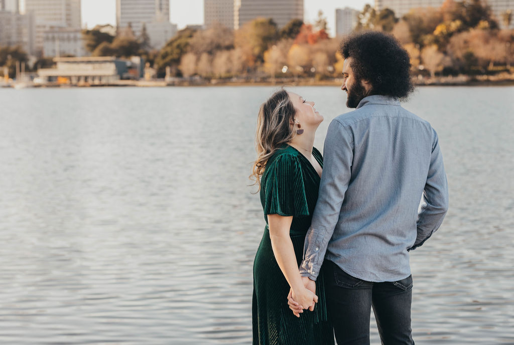 Couple posing for engagement photos in CA