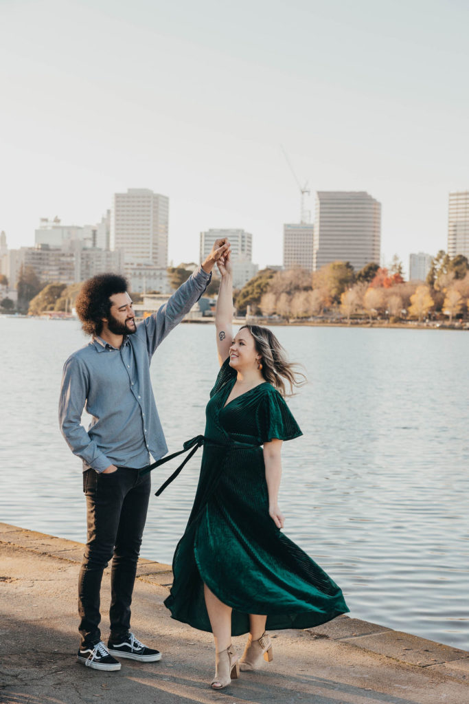 Couple posing for engagement photos in CA