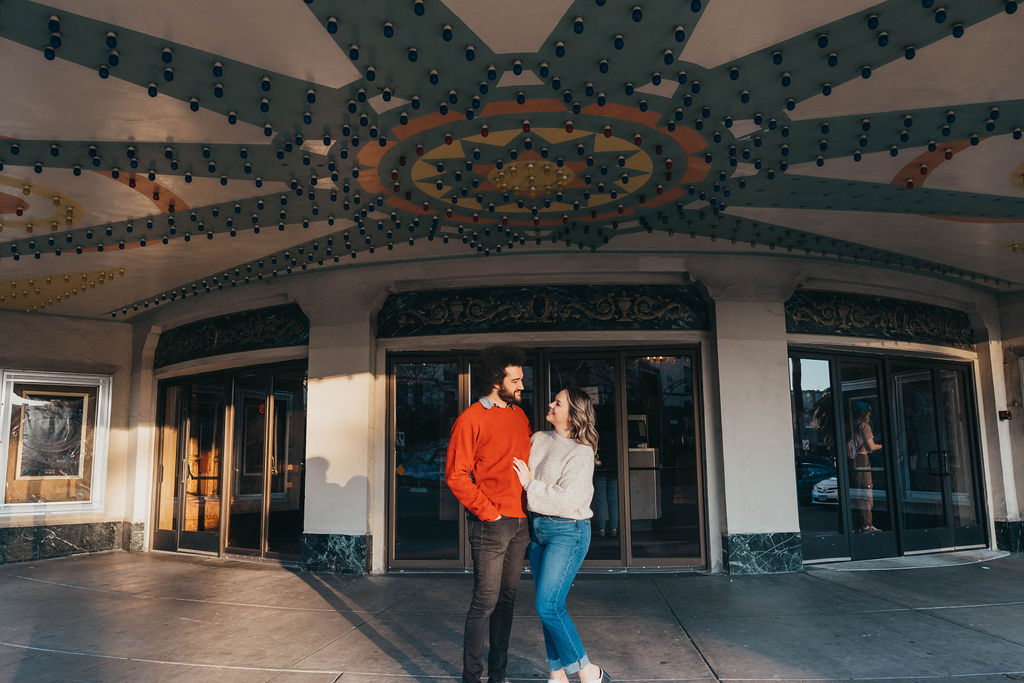 Couple posing for photos in downtown Oakland