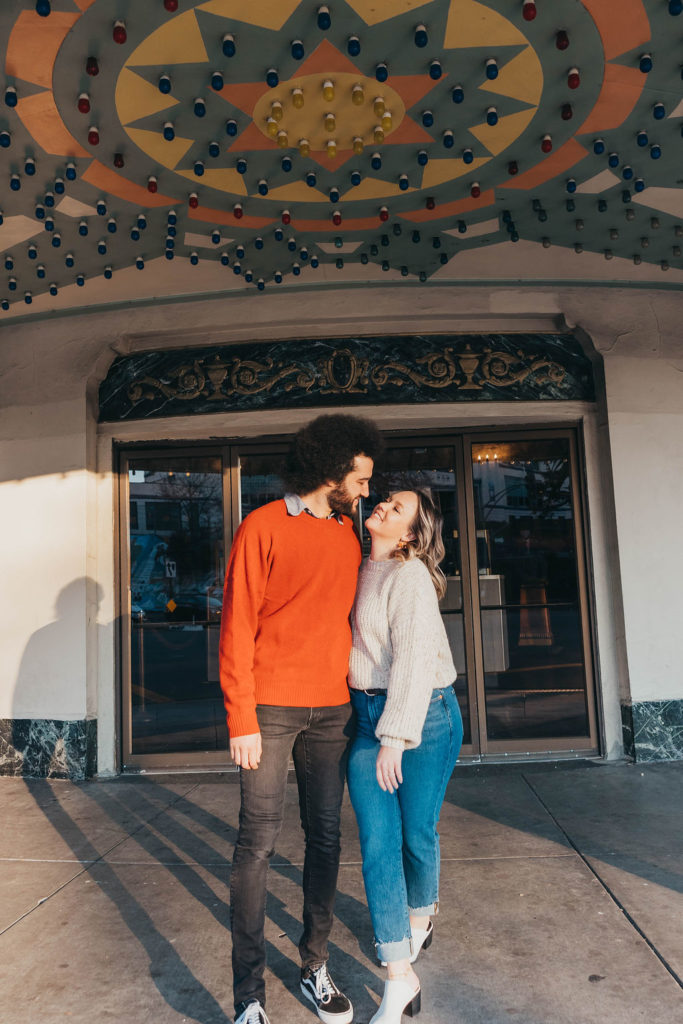 Couple posing for photos in downtown Oakland