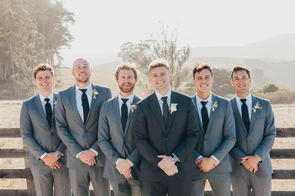 Groom and groomsman after wedding ceremony in California 