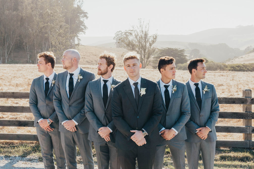 Groom and groomsman after wedding ceremony in California 