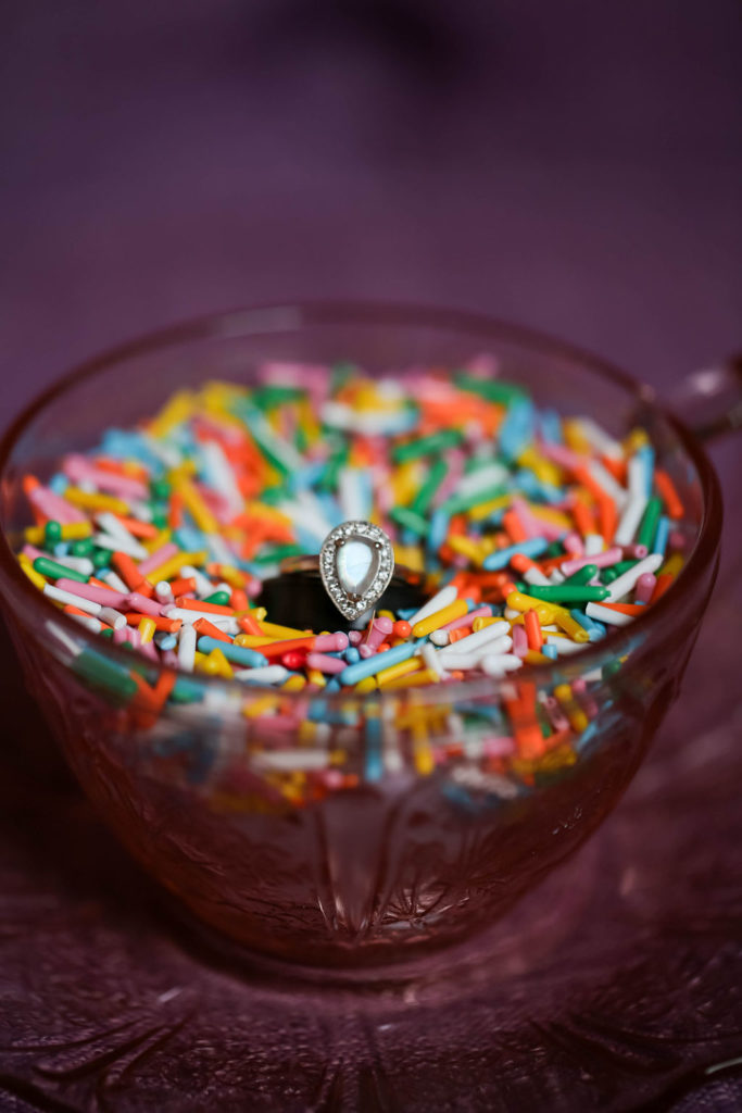wedding rings in a bowl of sprinkles
