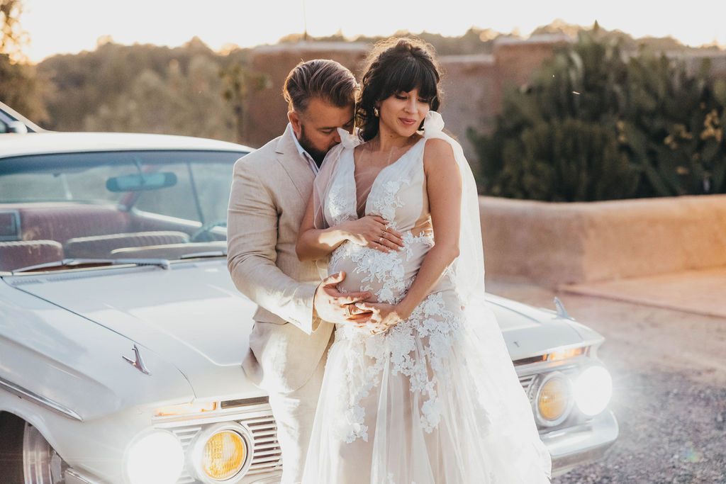 Bride and groom portraits with vintage car for small wedding in California - 