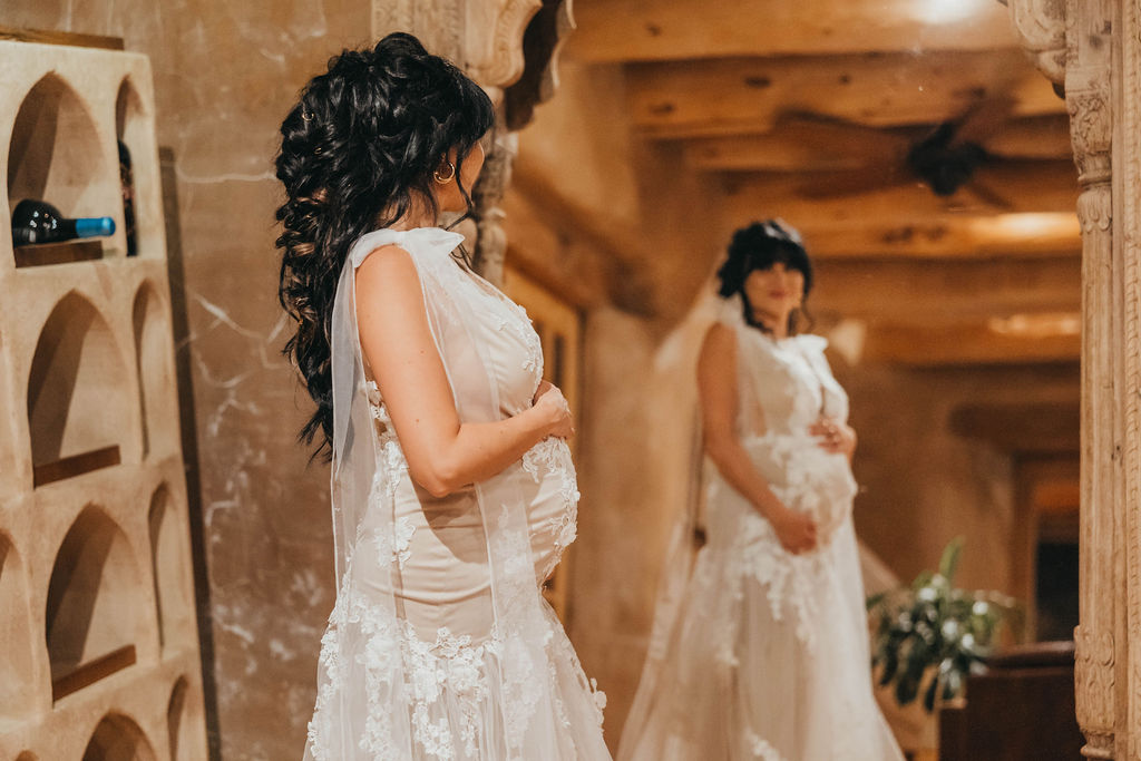 pregnant bride in wedding dress