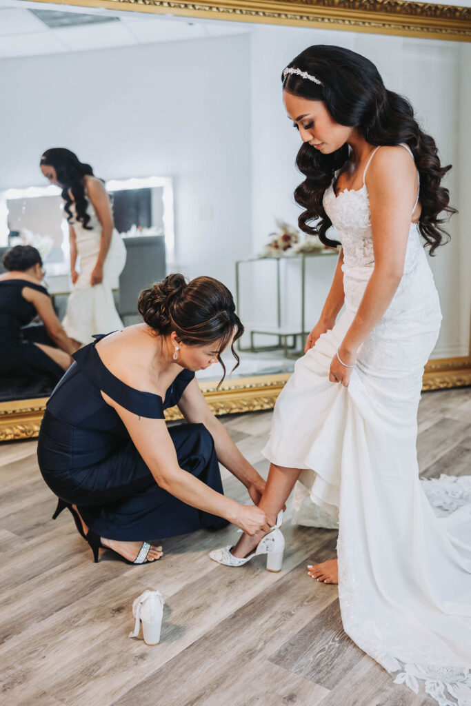 Bride getting dresses for ceremony