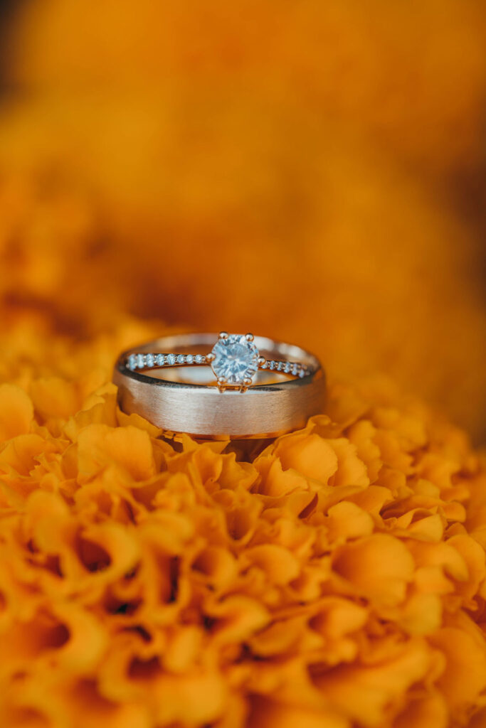 wedding rings on wedding flowers