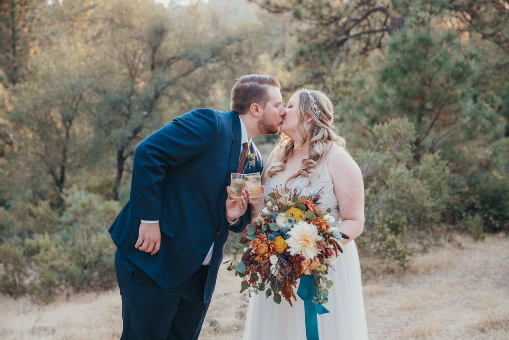 Bride and groom portraits from a rusitc outdoor fall wedding in California El Dorado County