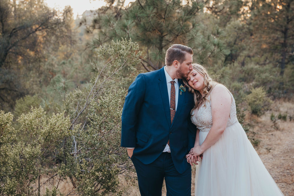Bride and groom portraits from a rusitc outdoor fall wedding in California El Dorado County