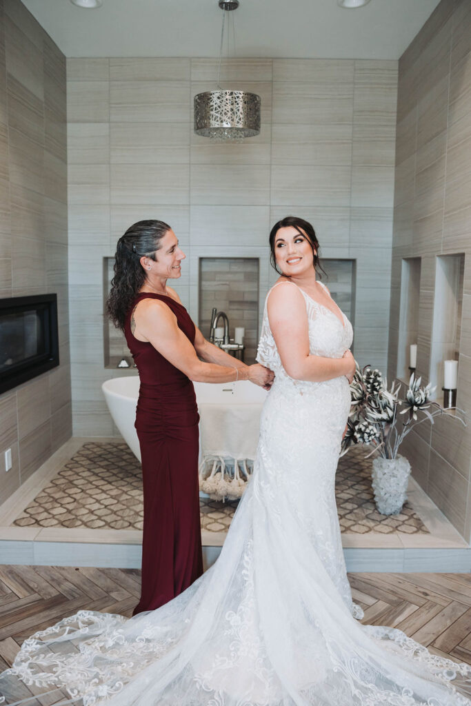 Bride getting ready with her mother