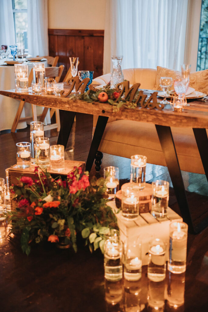 Jewel toned wedding reception sweetheart table