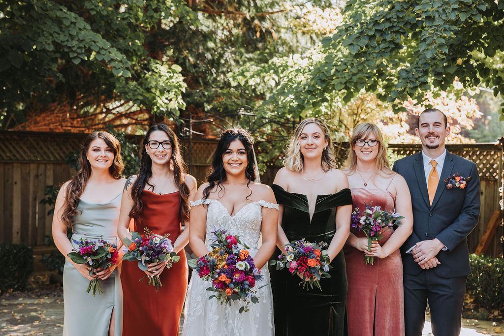 Bride and bridesmaids portraits from jewel toned wedding