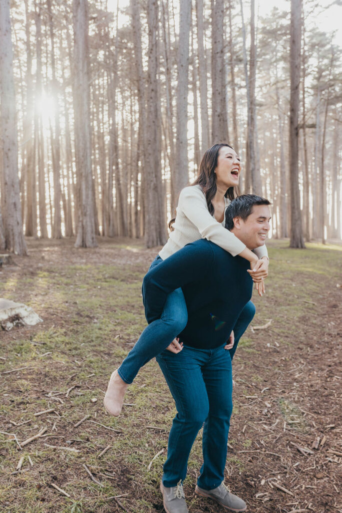 Couple posing for outdoor engagement session