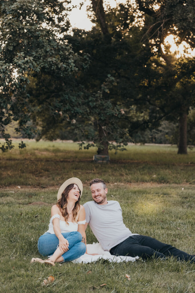 Couple posing for outdoor engagement session