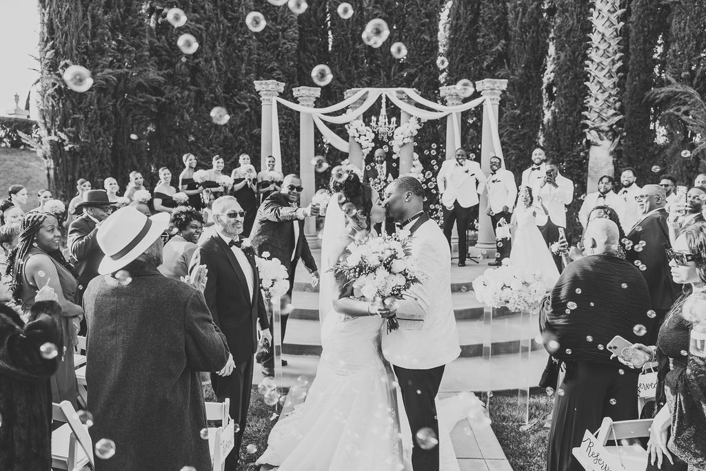 Bride and grooms bubble wedding exit 
