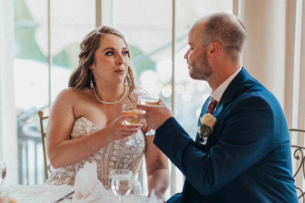 Bride and groom toasting