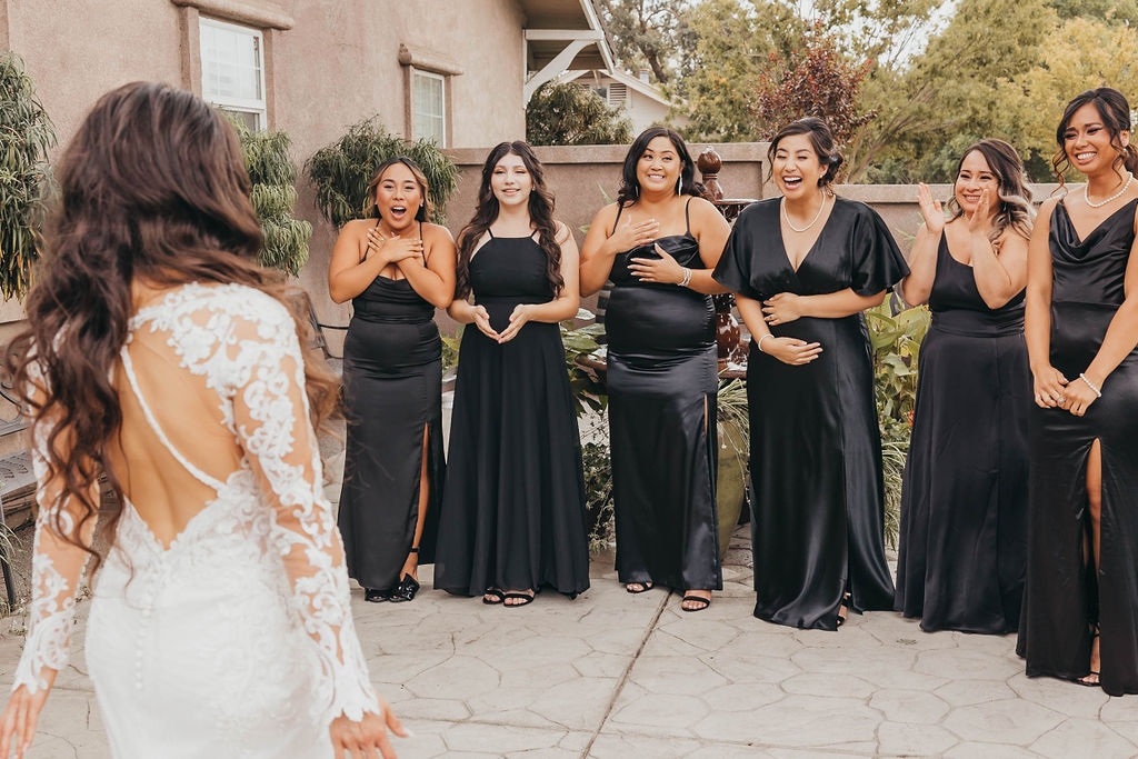 Bride and bridesmaids first looks from winter wedding at Woodbridge Golf and Country Club