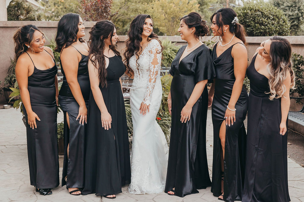 Bride and bridesmaids portraits from winter wedding at Woodbridge Golf and Country Club