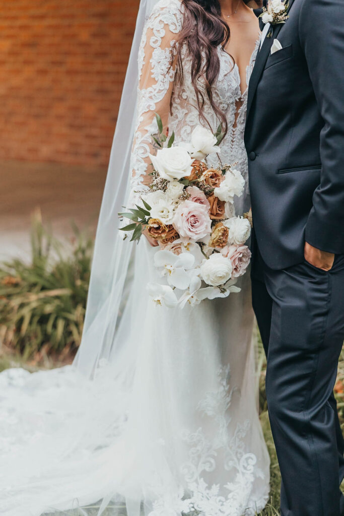 Bride and groom portraits from winter wedding at Woodbridge Golf and Country Club