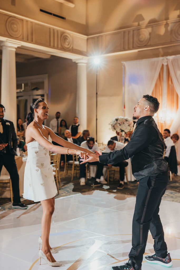 Bride and groom dancing during reception