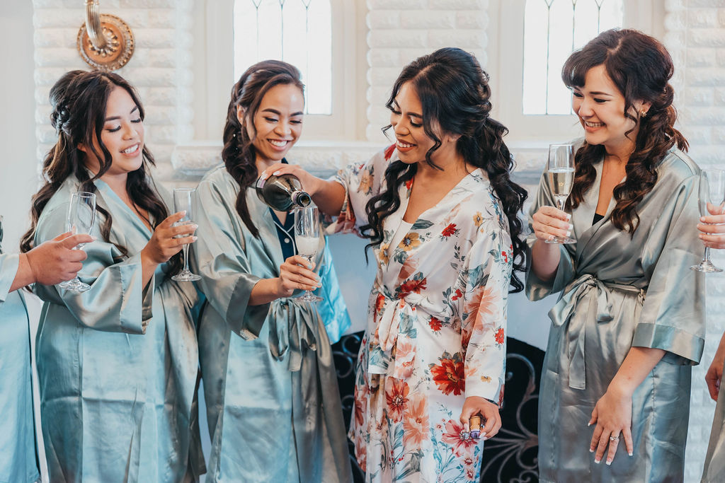 Bride and bridesmaids in robes 
