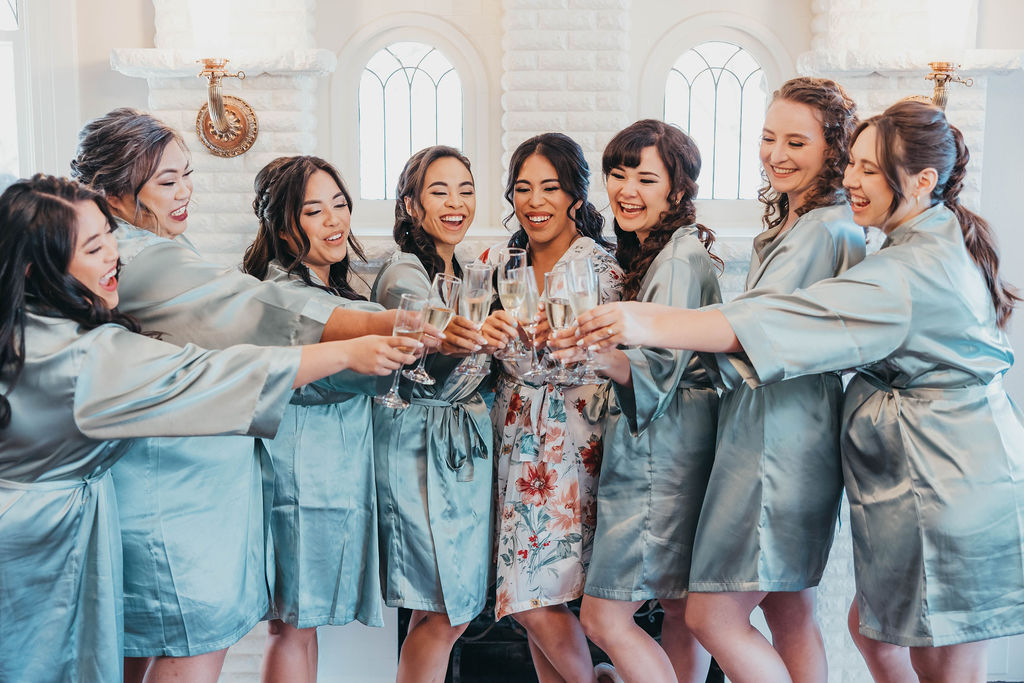 Bride and bridesmaids in robes 