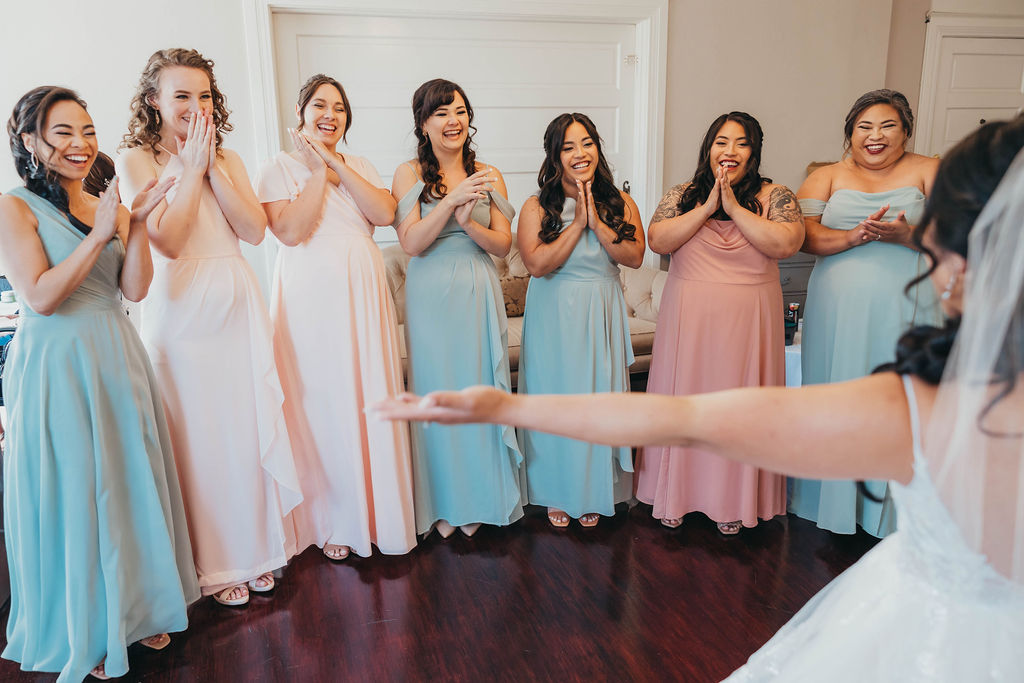 Brides first look with her bridesmaids 