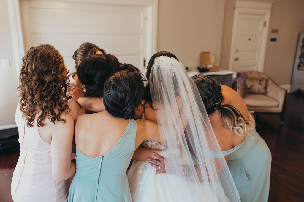 Brides first look with her bridesmaids 