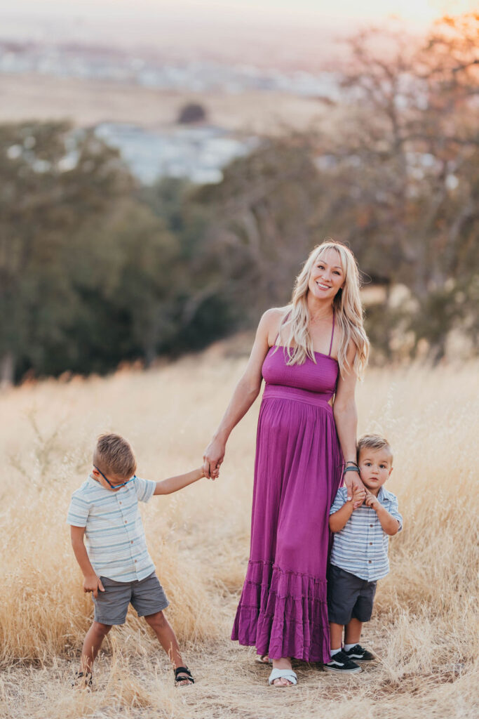 Pregnant mother and her two children posing for photos
