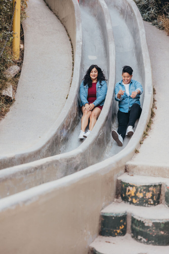 Couples engagement photos in San Francisco on the cement slides