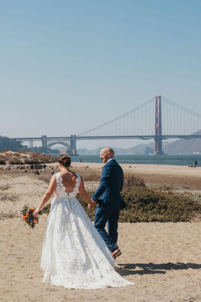 Bride and groom portraits at Crissy field for their destination California beach wedding