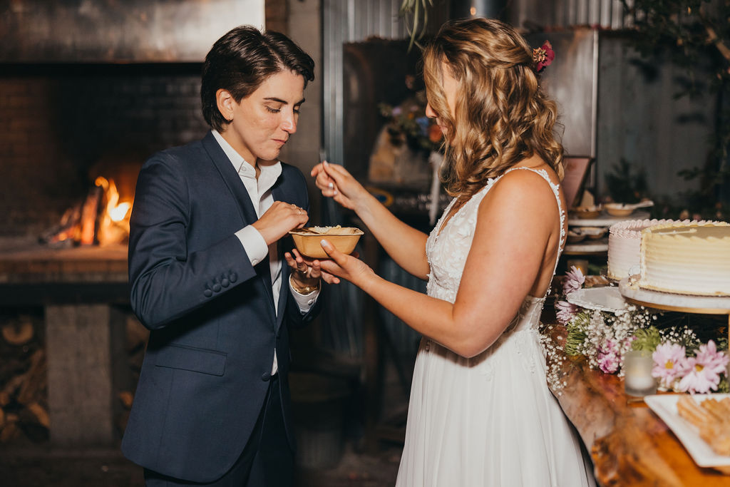 Wedding couple cutting cake