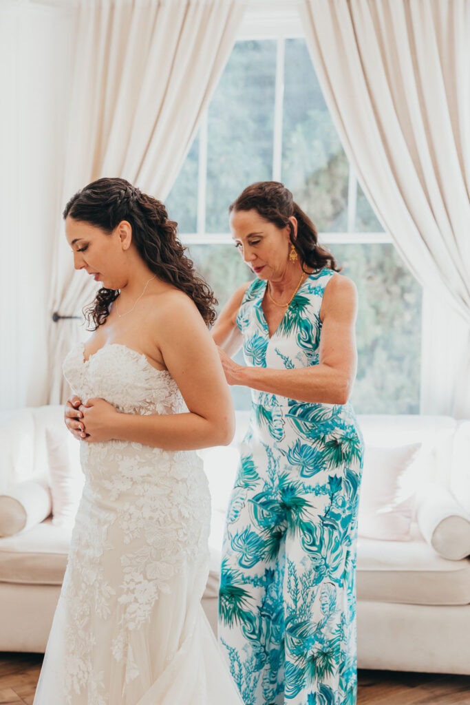 Bride and her mother getting ready