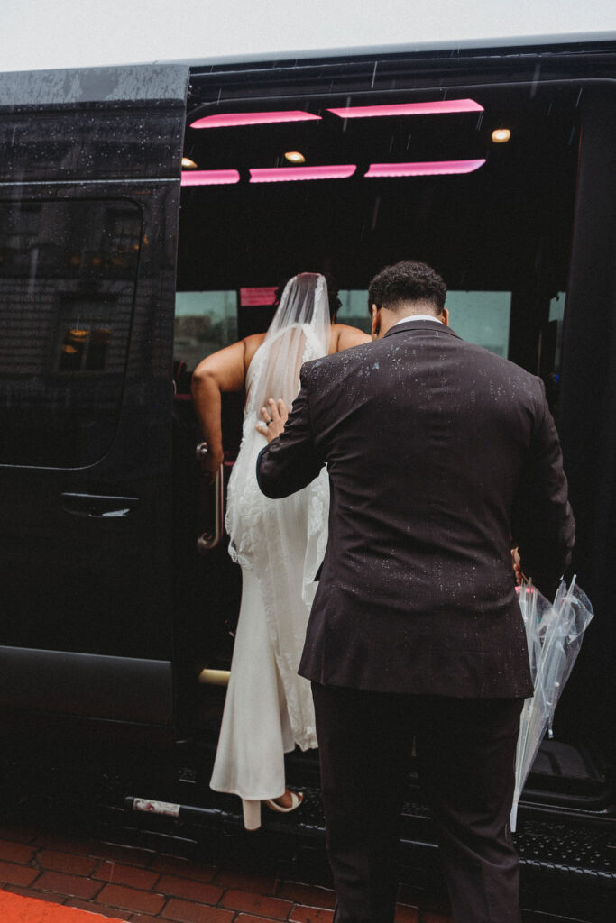 Couple leaving their elopement on a party bus. 