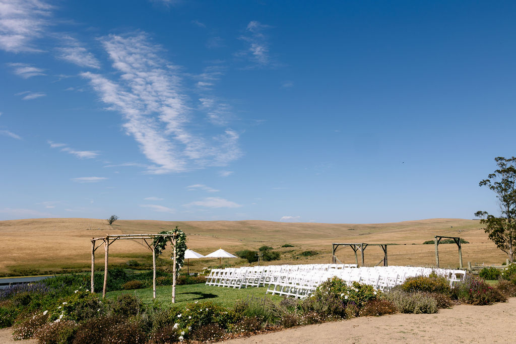 A beautiful summer wedding at The Haven at Tomales in California, showcasing a timeless and classic vibe.
