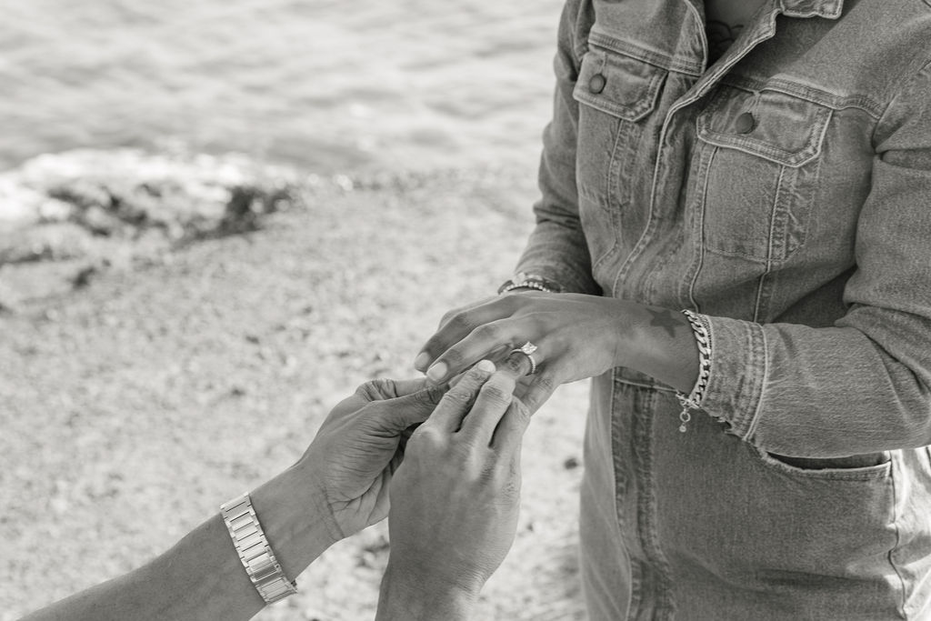 a couple posing for a coastal couples session