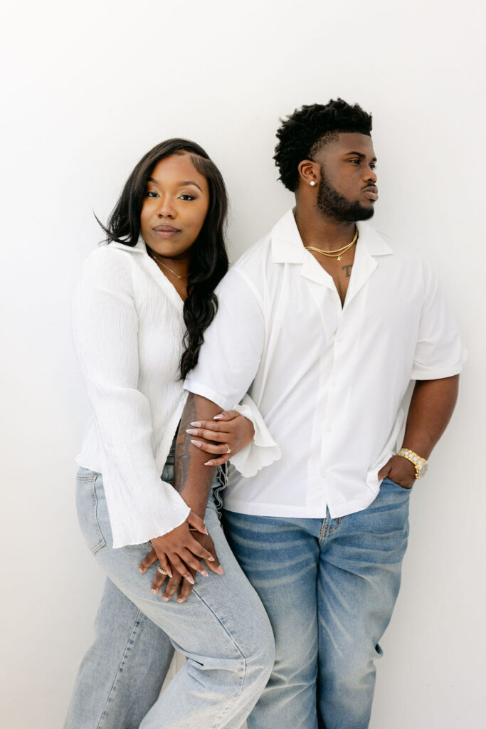 Sweet forehead kiss during an intimate engagement photo shoot | engagement session posing
